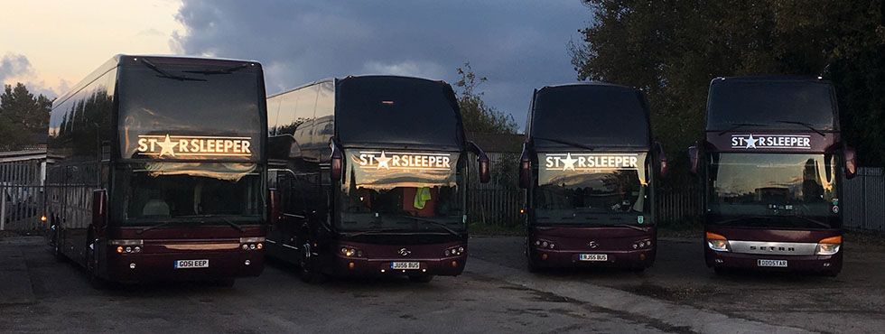 Double decker tour buses